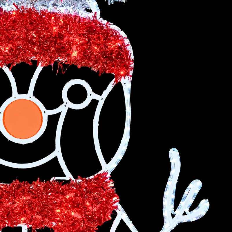 La Figura LED grande Muñeco de Nieve está fabricada con acero, material reciclado bioprint y adornada con festón